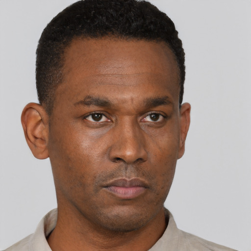 Neutral black young-adult male with short  brown hair and brown eyes