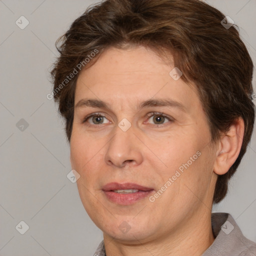 Joyful white adult female with short  brown hair and brown eyes