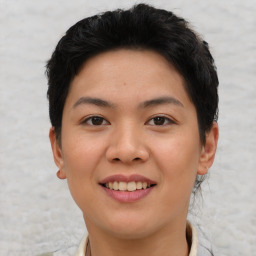 Joyful asian young-adult female with short  black hair and brown eyes