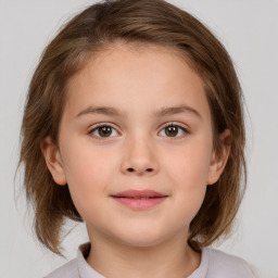 Joyful white child female with medium  brown hair and brown eyes