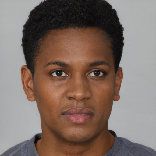 Neutral black young-adult male with short  brown hair and brown eyes