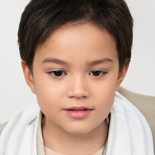 Joyful white child female with short  brown hair and brown eyes