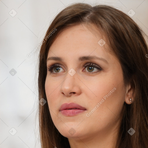 Neutral white young-adult female with long  brown hair and brown eyes