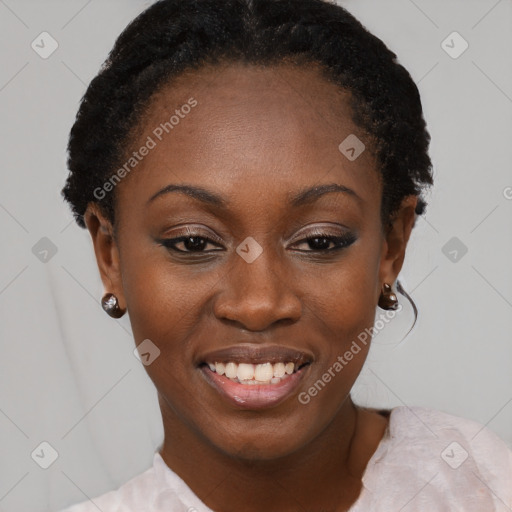 Joyful black young-adult female with short  black hair and brown eyes