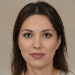 Joyful white young-adult female with medium  brown hair and brown eyes