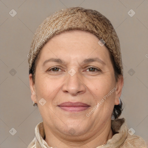 Joyful white adult female with short  brown hair and brown eyes