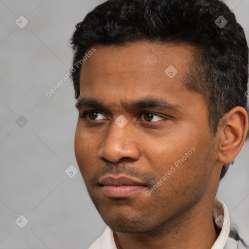 Neutral black young-adult male with short  black hair and brown eyes