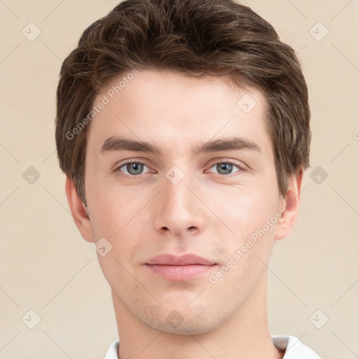 Neutral white young-adult male with short  brown hair and grey eyes