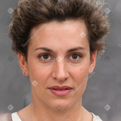 Joyful white adult female with short  brown hair and brown eyes