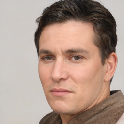 Neutral white adult male with short  brown hair and brown eyes