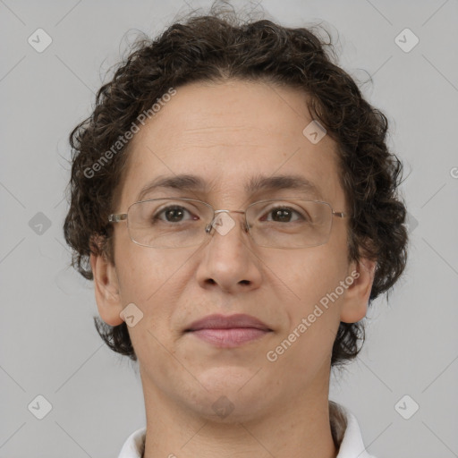 Joyful white adult female with short  brown hair and brown eyes