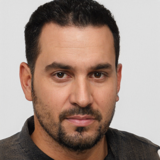 Neutral white adult male with short  brown hair and brown eyes