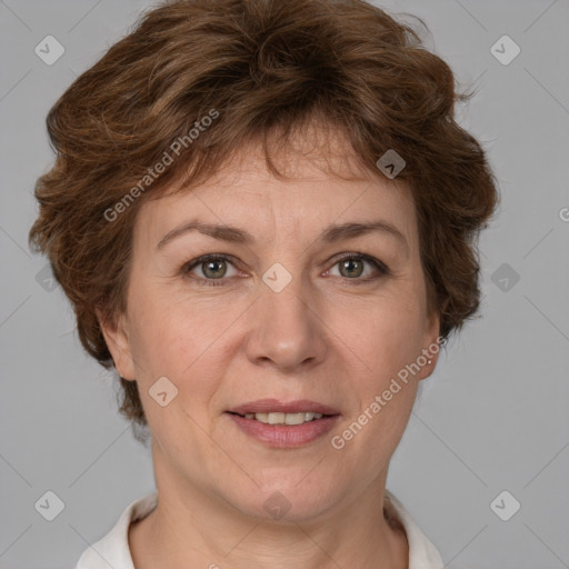 Joyful white adult female with short  brown hair and brown eyes