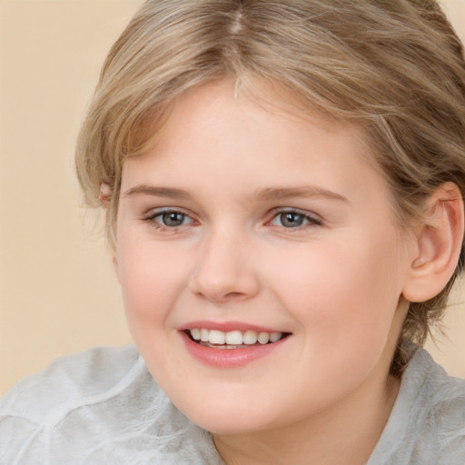 Joyful white child female with medium  brown hair and brown eyes