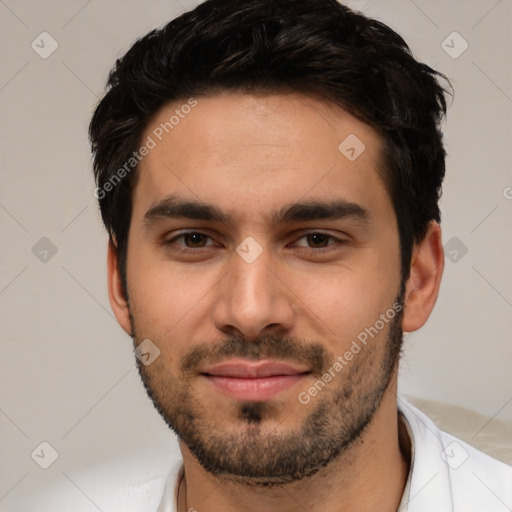 Joyful white young-adult male with short  black hair and brown eyes