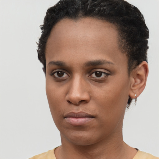 Neutral black young-adult female with short  brown hair and brown eyes