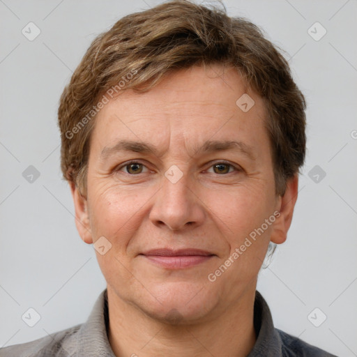 Joyful white adult male with short  brown hair and grey eyes