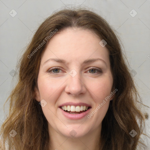 Joyful white young-adult female with long  brown hair and green eyes