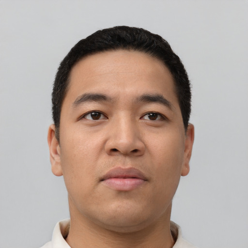 Neutral asian young-adult male with short  black hair and brown eyes