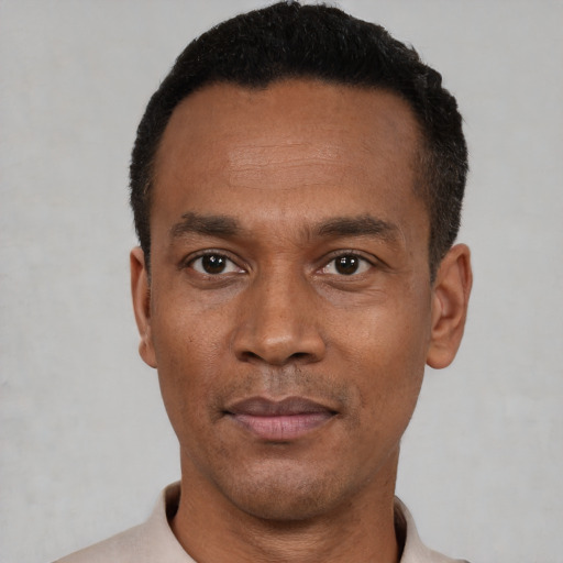 Neutral black young-adult male with short  black hair and brown eyes