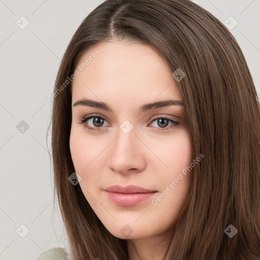 Neutral white young-adult female with long  brown hair and brown eyes