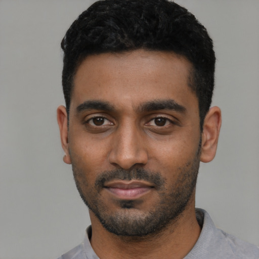 Neutral black young-adult male with short  black hair and brown eyes