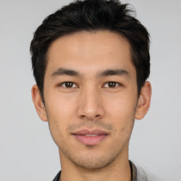 Neutral asian young-adult male with short  brown hair and brown eyes