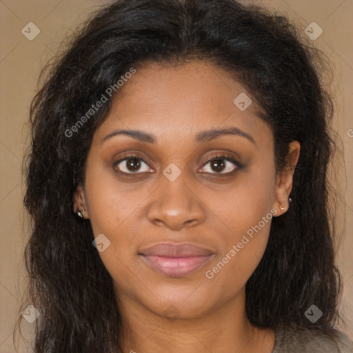 Joyful latino young-adult female with long  brown hair and brown eyes