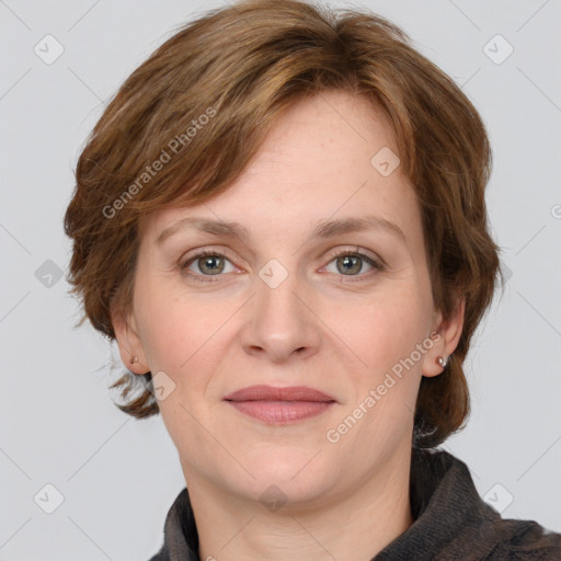 Joyful white adult female with medium  brown hair and grey eyes