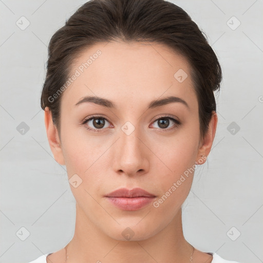 Neutral white young-adult female with short  brown hair and brown eyes