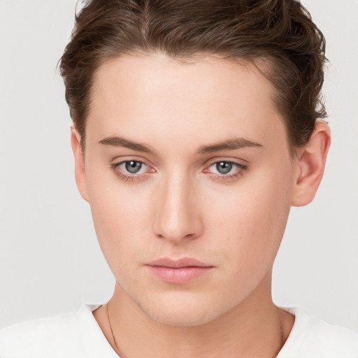 Neutral white young-adult female with short  brown hair and brown eyes