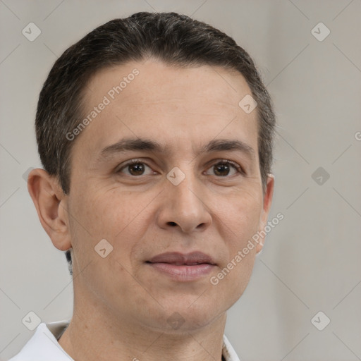 Joyful white adult male with short  brown hair and brown eyes