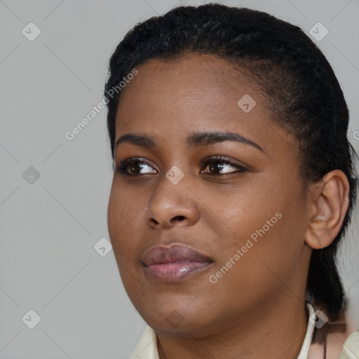 Neutral black young-adult female with short  black hair and brown eyes