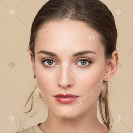 Neutral white young-adult female with long  brown hair and brown eyes