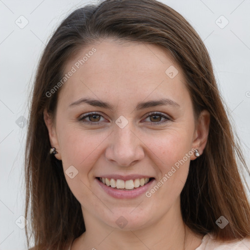 Joyful white young-adult female with long  brown hair and grey eyes