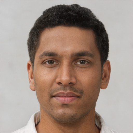 Neutral black young-adult male with short  black hair and brown eyes