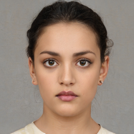 Neutral white young-adult female with medium  brown hair and brown eyes