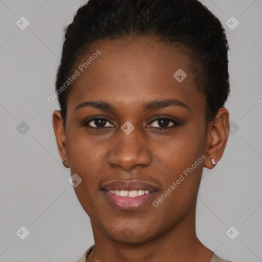 Joyful black young-adult female with short  brown hair and brown eyes