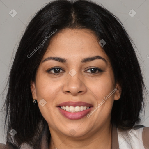 Joyful latino young-adult female with medium  brown hair and brown eyes