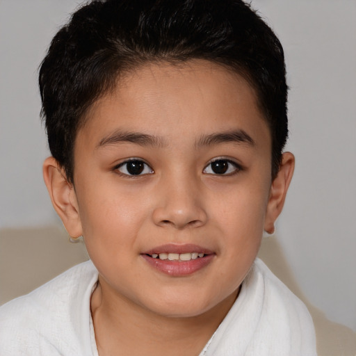 Joyful white child female with short  brown hair and brown eyes