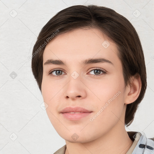 Neutral white young-adult female with short  brown hair and brown eyes