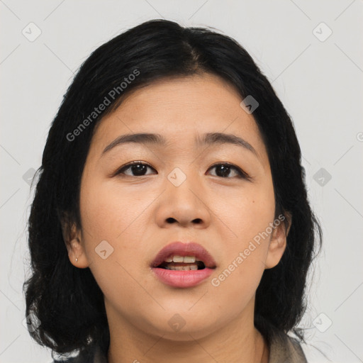 Joyful asian young-adult female with medium  black hair and brown eyes