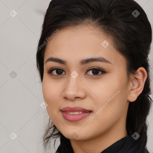 Joyful latino young-adult female with long  brown hair and brown eyes