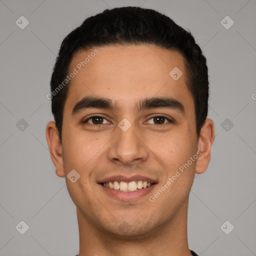 Joyful white young-adult male with short  black hair and brown eyes