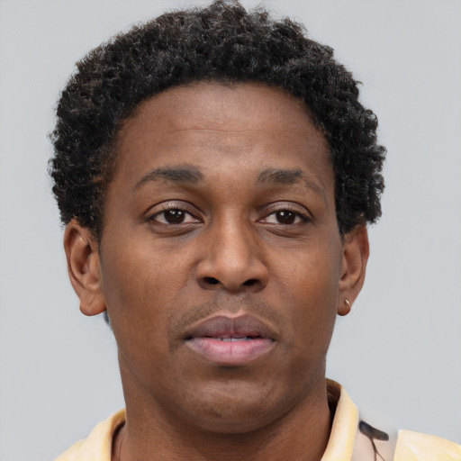 Neutral black young-adult male with short  brown hair and brown eyes