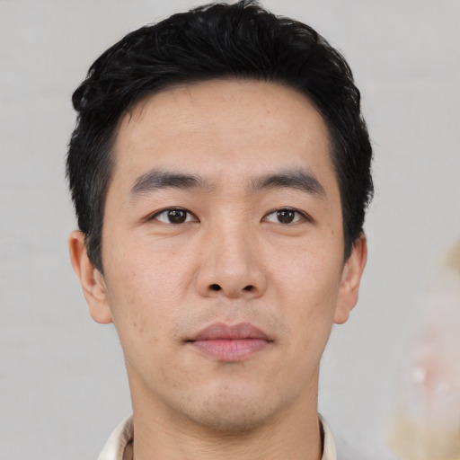 Neutral asian young-adult male with short  black hair and brown eyes