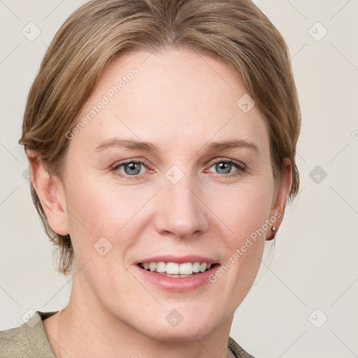 Joyful white young-adult female with medium  brown hair and blue eyes