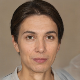 Joyful white adult female with short  brown hair and brown eyes