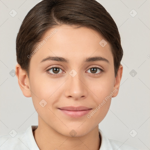 Joyful white young-adult female with short  brown hair and brown eyes