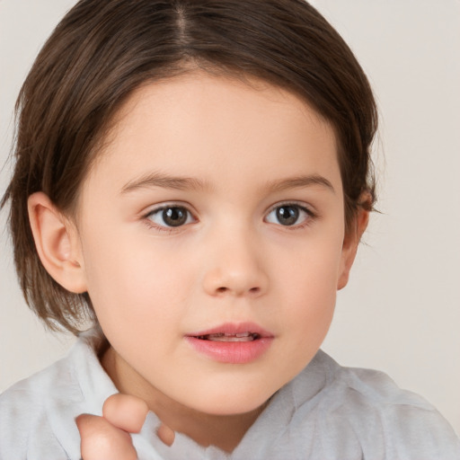 Neutral white child female with medium  brown hair and brown eyes